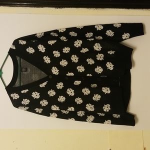 Black sweater with ghost print.